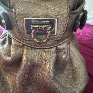Gold Ferragamo purse excellent condition